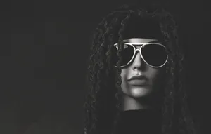 Woman In Dreadlocks Wearing Glasses Portrait Wallpaper