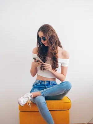 Woman In Trendy Off-shoulder Top Wallpaper