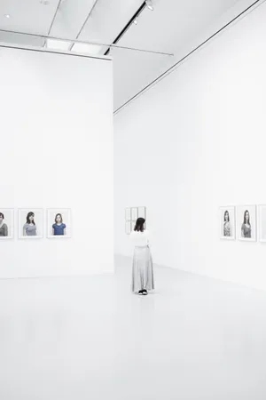 Woman Inside A Bright White Gallery Wallpaper