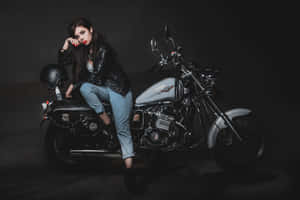 Woman Leaningon Regal Raptor Motorcycle Wallpaper