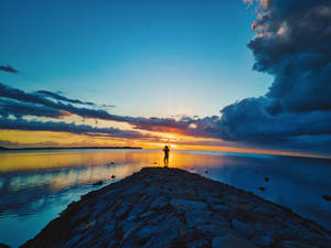 Woman On Rock In Mauritius Wallpaper