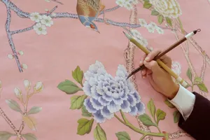 Woman Painting A Chic Wall Wallpaper