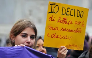 Woman With Yellow Placard About Abortion Rights Wallpaper
