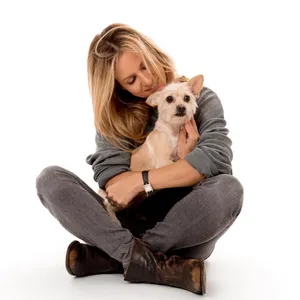 Womanand Dog Bonding Moment Wallpaper