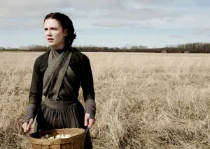 Womanin Historical Costumein Field Wallpaper