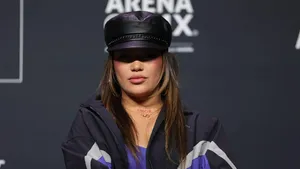 Womanin Leather Capand Track Jacket Wallpaper