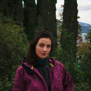 Womanin Purple Jacket Outdoors Wallpaper