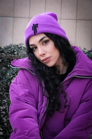 Womanin Purple Winter Apparel Wallpaper