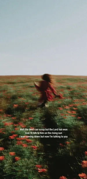 Womanin Red Dress Fieldof Flowers Wallpaper