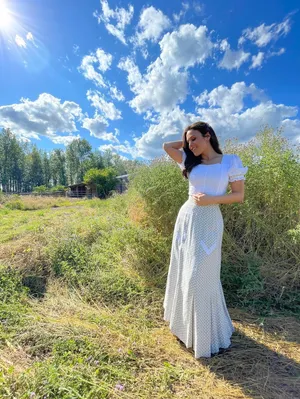 Womanin White Dress Sunny Countryside Wallpaper