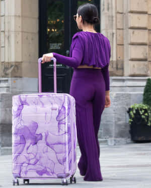 Womanwith Purple Luggage Wallpaper