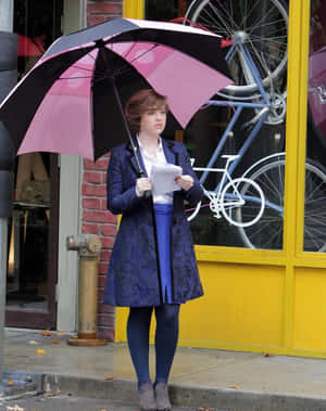 Womanwith Umbrellaand Document Wallpaper