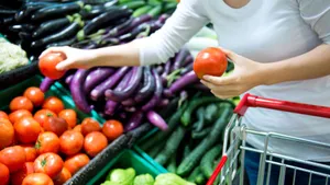 Women Shopping Fresh Vegetables At Grocery Store Wallpaper