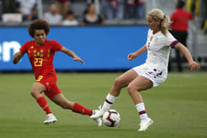 Women Soccer Midfield Duel Wallpaper