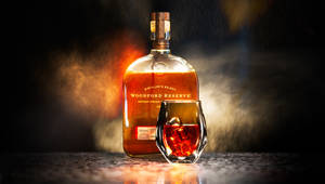 Woodford Reserve Whiskey Bottle With Glass Wallpaper