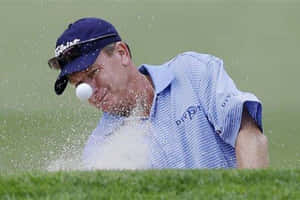 Woody Austin Hitting A Ball Wallpaper