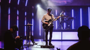 Worship_ Leader_ Guitar_ Performance Wallpaper