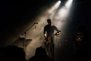 Worship_ Leader_ In_ Concert_ Silhouette Wallpaper