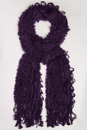 Wrap Yourself Up In Warmth And Style With A Purple Scarf Wallpaper