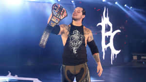 Wrestler Baron Corbin With Championship Belt Wallpaper