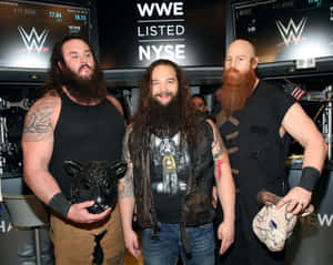 Wrestlers Braun Strowman With Bray Wyatt And Erick Rowan Wallpaper