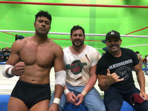 Wrestlers Posingin Ring Side Area Wallpaper