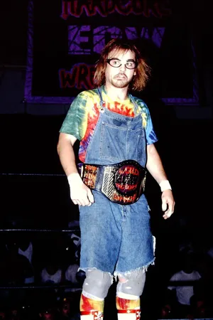 Wrestlerwith Championship Belt Wallpaper