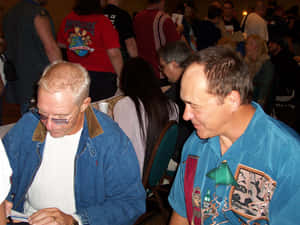 Wrestling Legends Larry Zbyszko And Bobby Heenan In Action Wallpaper