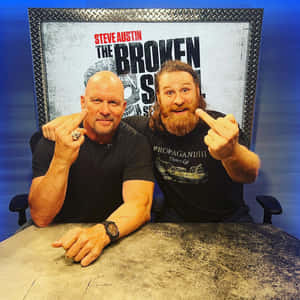 Wrestling Legends - Steve Austin Challenging Sami Zayn Wallpaper