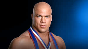 Wwe Hall Of Famer Kurt Angle Poses In Black And Blue Gradient Background Wallpaper