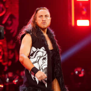 Wwe Star Pete Dunne In Action Wallpaper