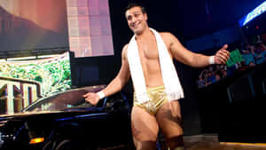 Wwe Superstar Alberto Del Rio Posing With His Luxury Car Wallpaper