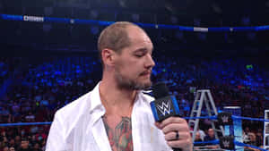 Wwe Superstar Baron Corbin In Mid-interview Action Wallpaper