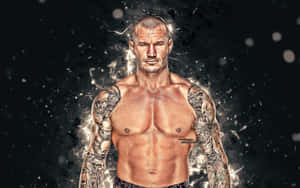 Wwe Superstar Randy Orton Showing Off His Championship Belt. Wallpaper