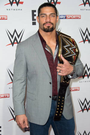 Wwe Superstar Roman Reigns On Raw Red Carpet Wallpaper