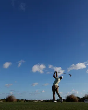 Xander Schauffele Perfect Swinging Form Wallpaper