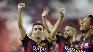 Xavi Celebrationwith Teammates F C Barcelona Wallpaper