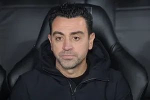 Xavi Hernandez Concentratedon Bench Wallpaper
