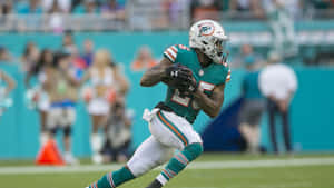 Xavien Howard Miami Dolphins Running Wallpaper