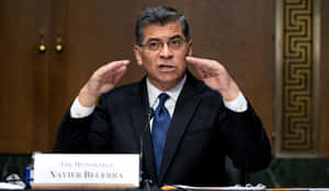 Xavier Becerra Delivering A Passionate Speech Wallpaper