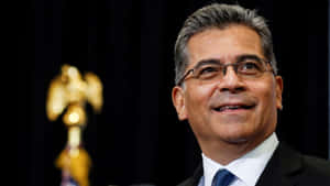 Xavier Becerra Smiling Calmly Wallpaper