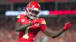 Xavier Worthy Celebrates Touchdown Wallpaper