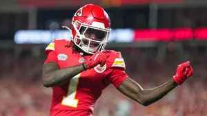 Xavier Worthy Celebrates Touchdown Wallpaper