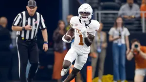 Xavier Worthy Football Action Wallpaper