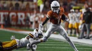 Xavier Worthy Football Highlight Wallpaper