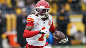 Xavier Worthy Football Highlight Wallpaper