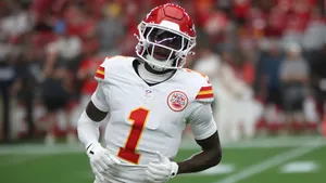 Xavier Worthy Football Highlights Wallpaper