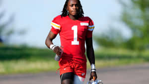 Xavier Worthy Football Star Wallpaper