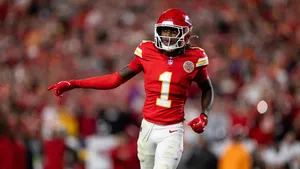 Xavier Worthy On Field Wallpaper