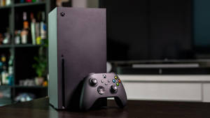 Xbox One X On Table Wallpaper